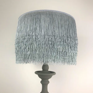 Silver grey tassel lampshade with Cole & Son liner