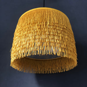 Gold tassel lampshade with Cole & Son liner