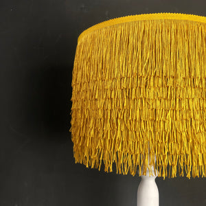 Gold tassel lampshade with Cole & Son liner