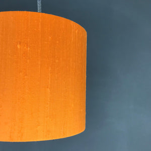 Tangerine silk lampshade with mirror gold liner